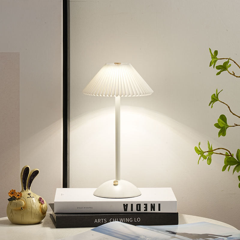 Contemporary Scandinavian rechargeable iron fabric conical folded LED table lamp for bedside