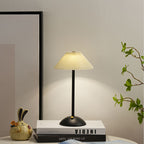 Contemporary Scandinavian rechargeable iron fabric conical folded LED table lamp for bedside