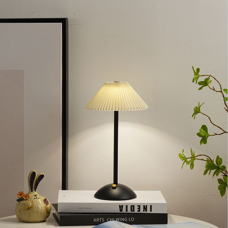 Contemporary Scandinavian rechargeable iron fabric conical folded LED table lamp for bedside