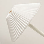 Contemporary Scandinavian rechargeable iron fabric conical folded LED table lamp for bedside