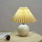 Nordic minimalist 1-light table lamp made of ceramic with folds