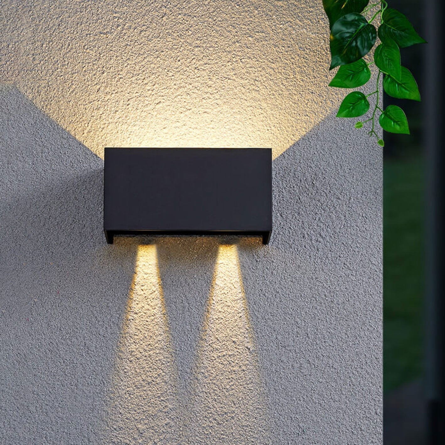 Modern waterproof rectangular LED wall light for outdoor use with upward and downward lighting