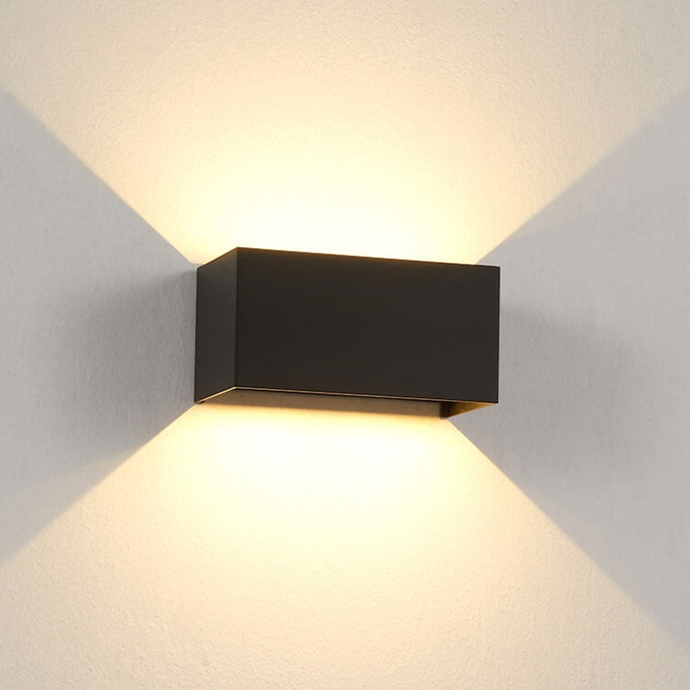 Modern waterproof rectangular LED wall light for outdoor use with upward and downward lighting