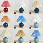 Nordic minimalist 1-light table lamp made of ceramic with folds