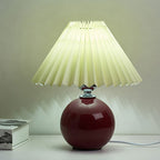 Nordic minimalist 1-light table lamp made of ceramic with folds