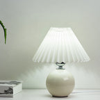 Nordic minimalist 1-light table lamp made of ceramic with folds