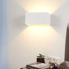 Modern waterproof rectangular LED wall light for outdoor use with upward and downward lighting