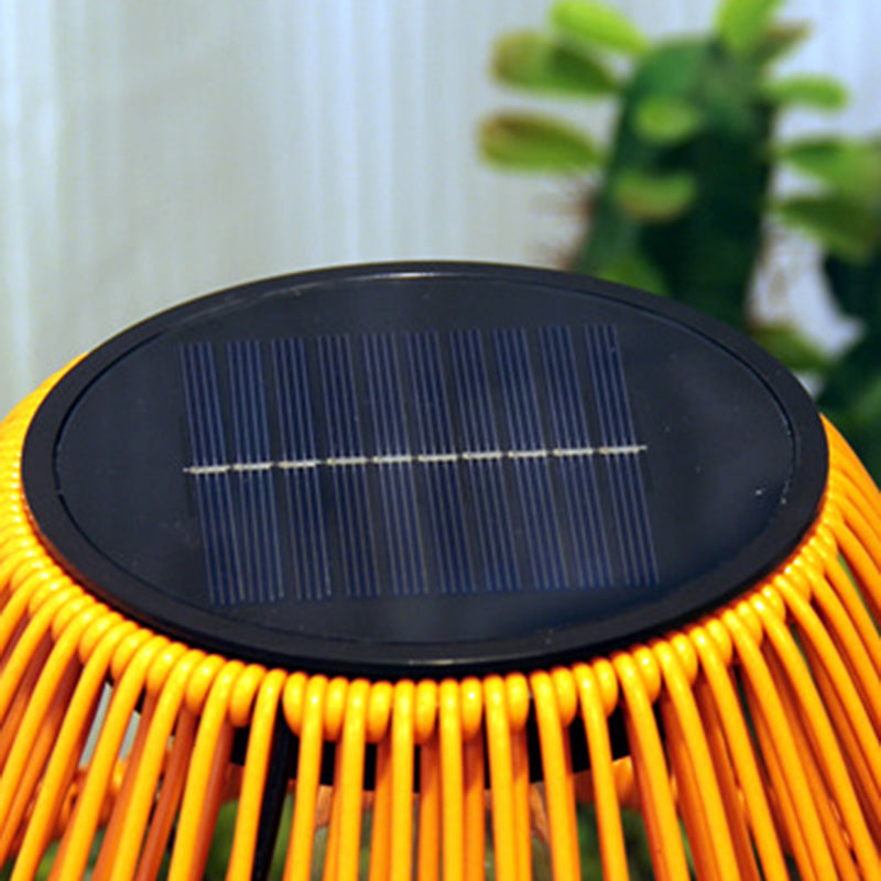 Traditional farmhouse waterproof solar-powered rechargeable weaving gum rattan iron conical LED outdoor table lamp for garden