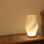 DreamWave - Modern cream-colored 3D wave lamp with elegant metal frame